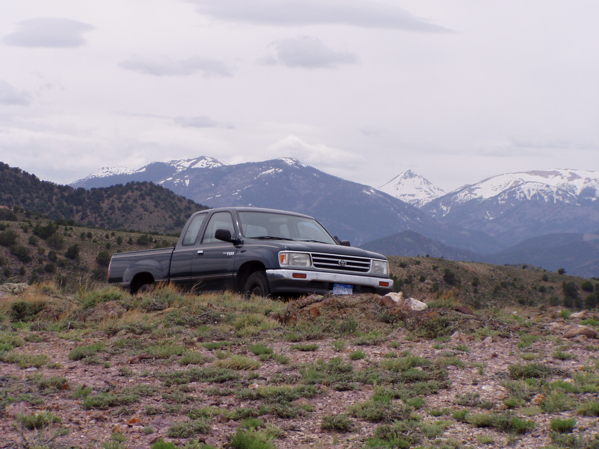 Truck with Tusher Mtns. South-Central Utah